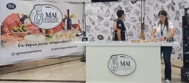 Banner MaiGourmet impreso en el stand